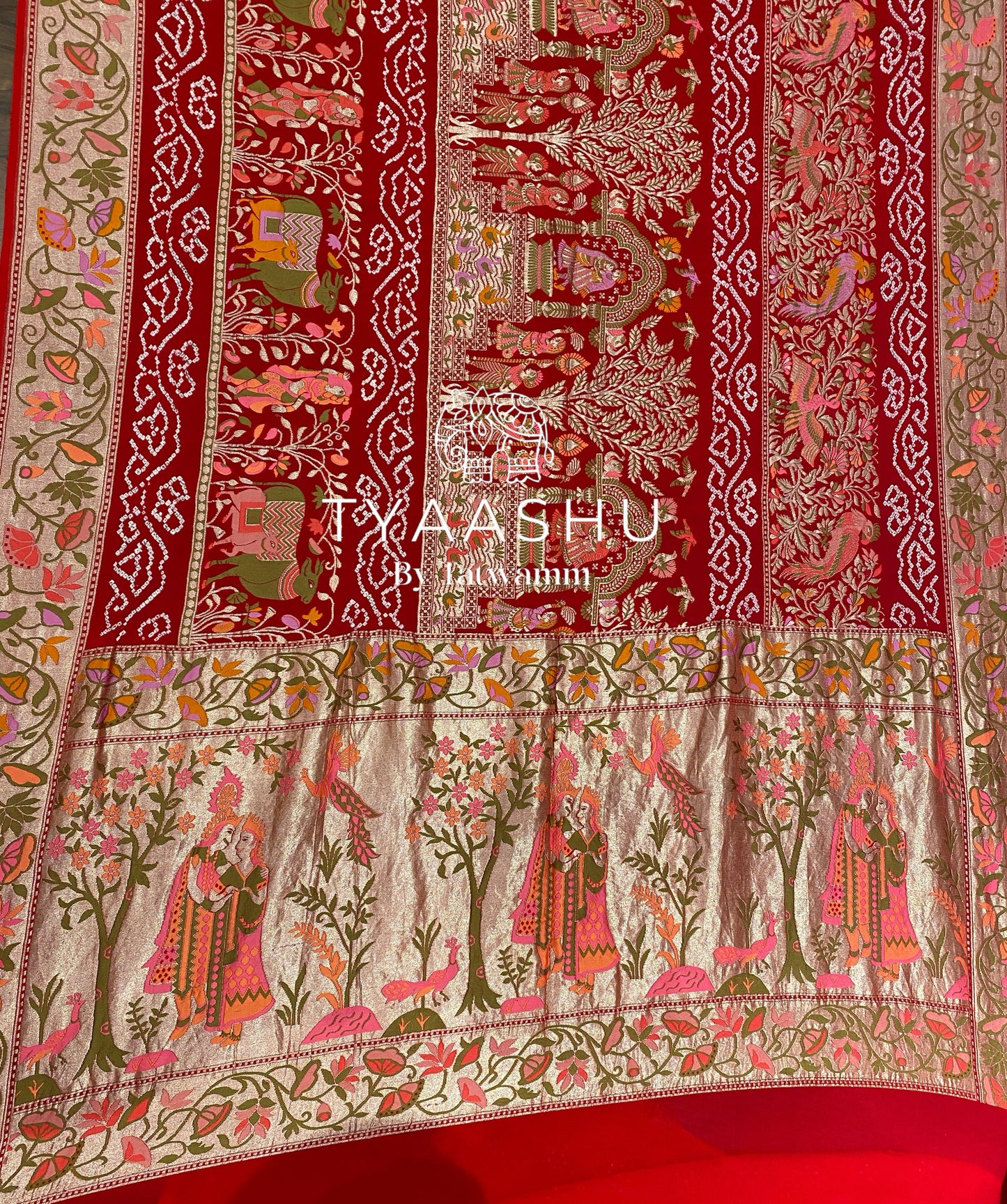 RED BANDHANI SAREE WITH INTRICATE MEENAKARI