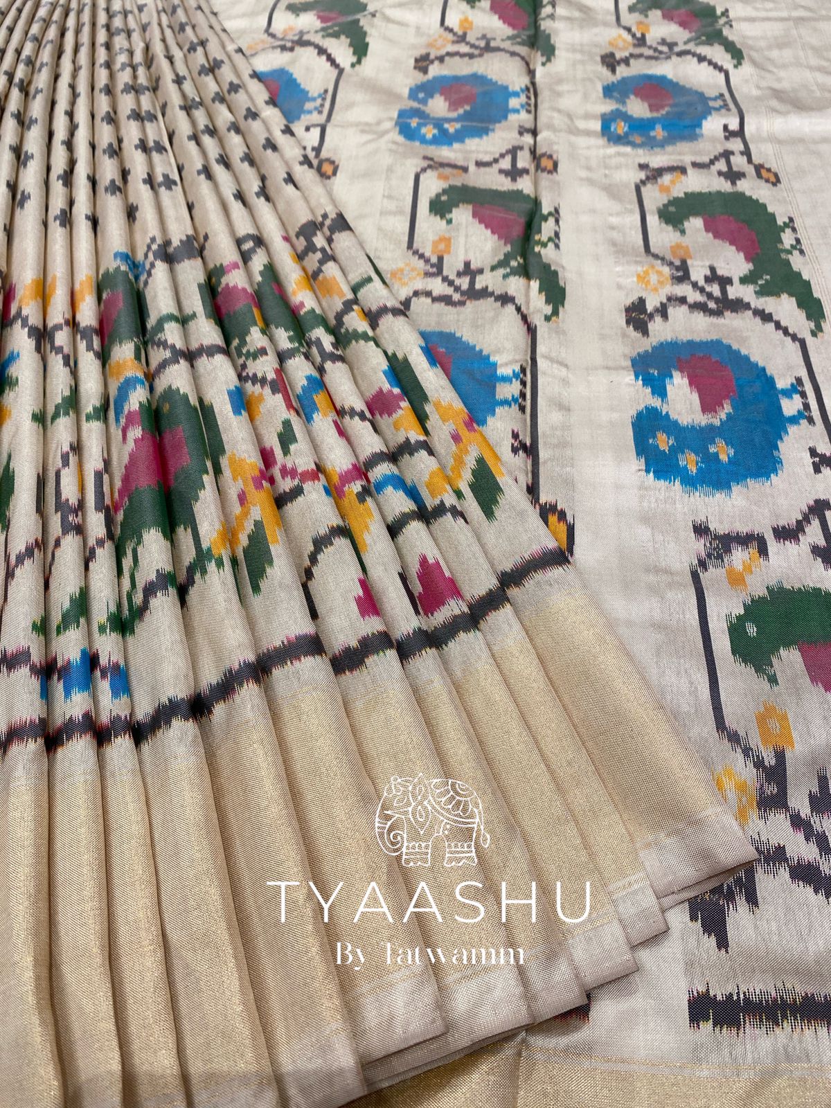ELEGANT BEIGE IKAT SAREE